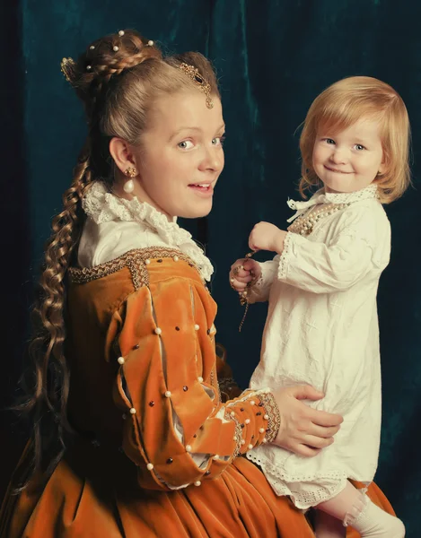 stock image beautiful blonde woman wearing renaissance dress playing with Li