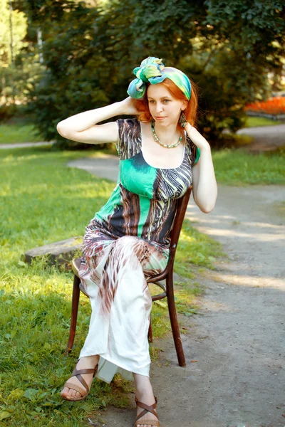 Girl wearing a turban and a stylized ethnic costum — Stock Photo, Image