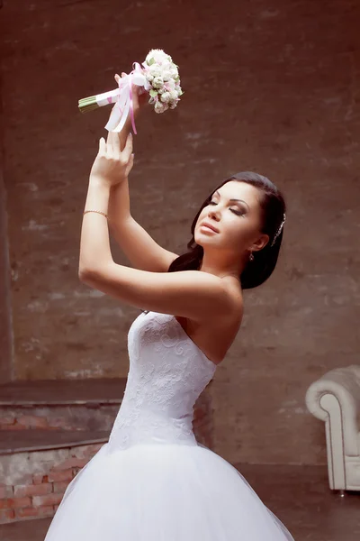 Brunette bride posing in studio — Stock Photo, Image