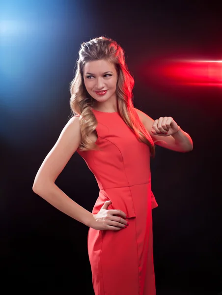 Blonde woman wearing little red dress — Stock Photo, Image