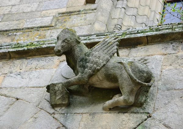 Winged Ox with the bookon the front of  Saint Saviour Basilica — Stock Photo, Image