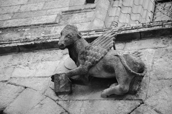 Winged Ox with the bookon the front of  Saint Saviour Basilica — Stock Photo, Image