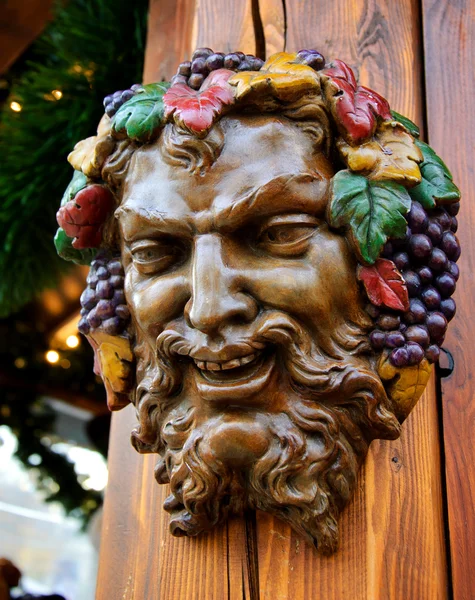 Bacchus (Dionysos) maskesi Noel pazarında — Stok fotoğraf