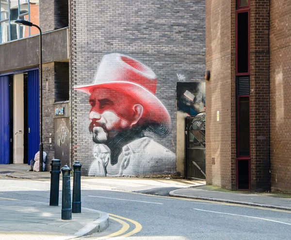 Cowboy graffiti op de muur van de straat Hewlett — Stockfoto