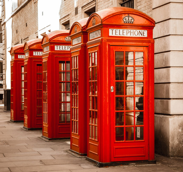 Five traditional red phone boxes