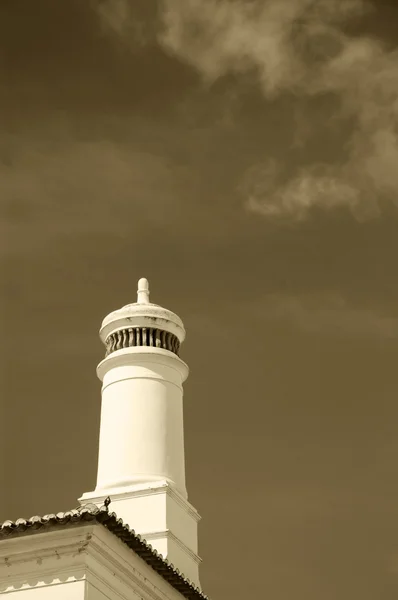 Chimney on the traditional Portuguese house. Real estate in Portugal. Evora, Portugal. Aged photo. Sepia. — Stock Photo, Image