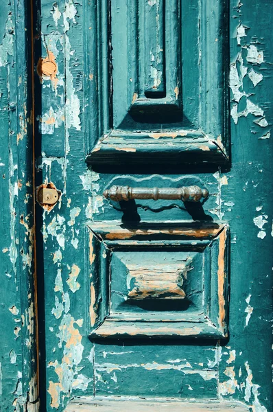 Weathered wooden door. Lisbon, Portugal. Toned photo. — Stock Photo, Image