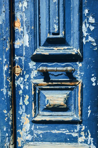 Weathered wooden door. Lisbon, Portugal. Toned photo. — Stock Photo, Image