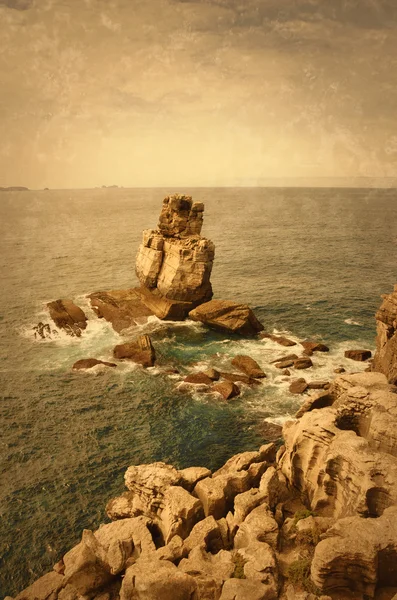 Beautiful rocks in water. Atlantic ocean coast near Peniche (Portugal).  Retro aged photo with scratches. — Stock Photo, Image