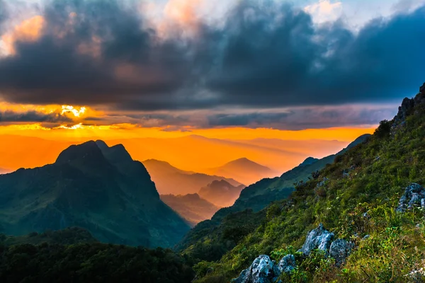 The sun over a mountain range at Doi Luang Chiang Dao, High moun — Stock Photo, Image