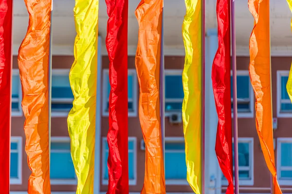 Festive flags of different colors — Stock Photo, Image