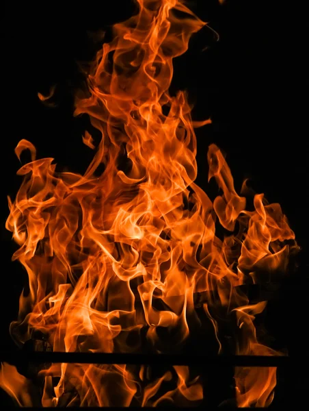 Raging flames red fire black background — Stock Photo, Image