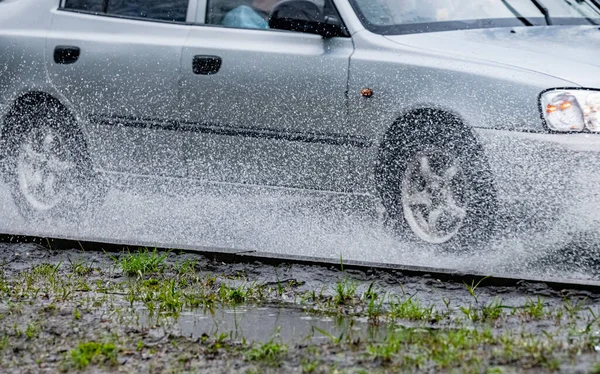 Motion Car Rain Big Puddle Water Spray Wheels — Stok Foto