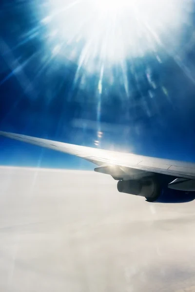 View of the wing of an airplane through the window — Stock Photo, Image