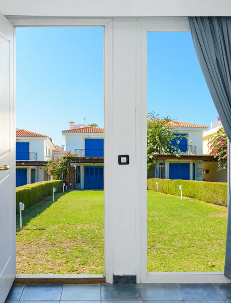 Nature landscape with a view through a window with curtains — Stock Photo, Image