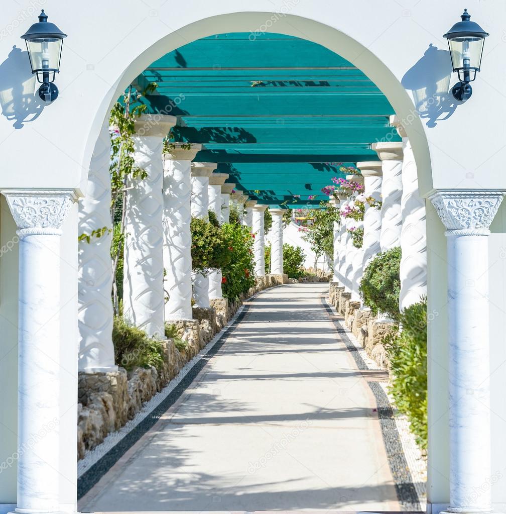 open door arch with access to the alley