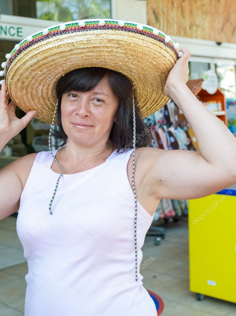 happy woman in a hat