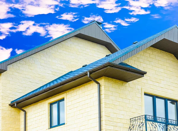 House with a gable roof window Stock Picture