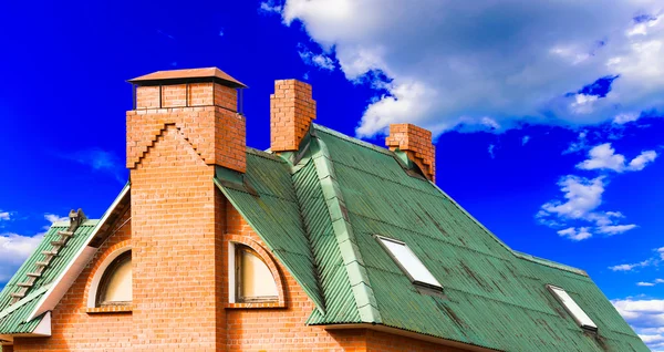 House with a gable roof window Stock Image