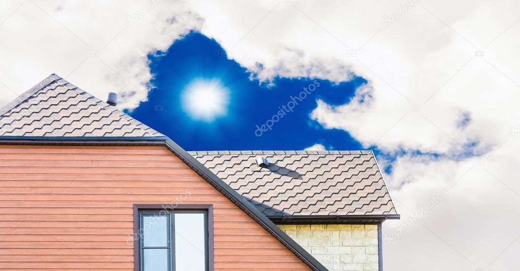 house with a gable roof window