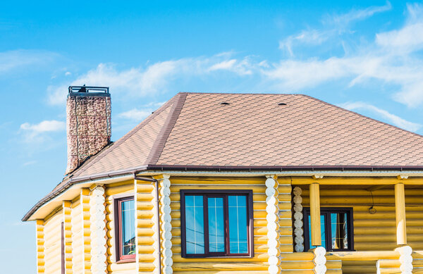 house with a gable roof window