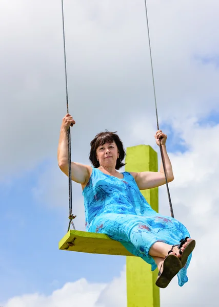 Woman on a swing — Stock Photo, Image