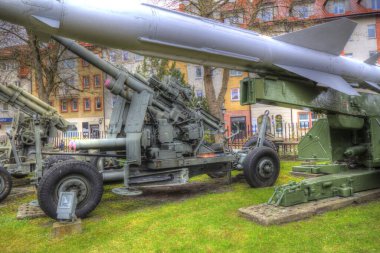 Ballistic missile launcher with four cruise missiles on powerful mobile transportation, antiaircraft forces, military industry