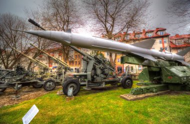 Ballistic missile launcher with four cruise missiles on powerful mobile transportation, antiaircraft forces, military industry