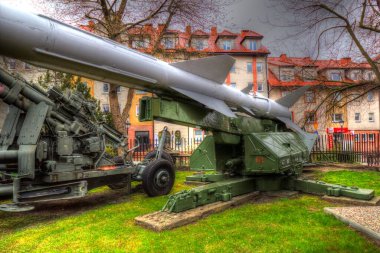 Ballistic missile launcher with four cruise missiles on powerful mobile transportation, antiaircraft forces, military industry