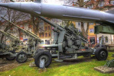 Ballistic missile launcher with four cruise missiles on powerful mobile transportation, antiaircraft forces, military industry