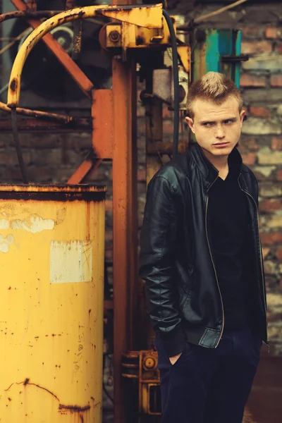 Bad boy concept. Portrait of brutal young man with short hair — Stock Photo, Image