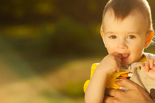 New life born concept. Portrait of cute baby boy sitting in dad's hands — Stock Photo, Image