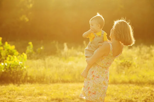 Happy family, friends forever concept. Profile portrait of mother and son — Stock Photo, Image