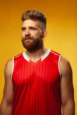 Fabulous at any age. Emotive portrait of smiling charismatic muscular 30-year-old man standing over yellow background. Perfect haircut. Sport style. Studio shot clipart