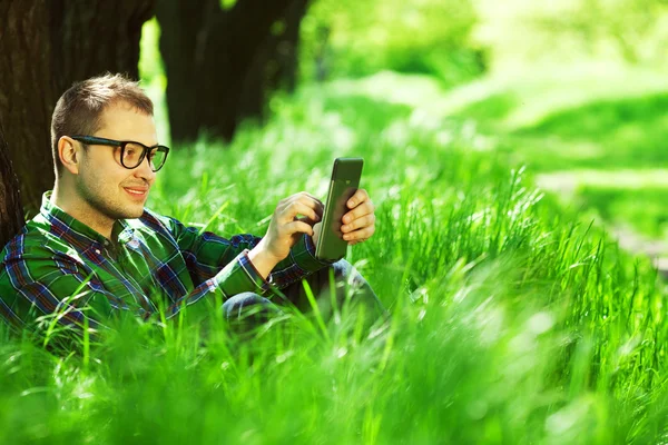 Gadget freak concept. Portrait of funny hipster in casual clothi — Stock Photo, Image