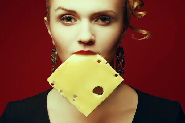 Addicted to cheese concept. Arty portrait of fashionable young w — Stock Photo, Image