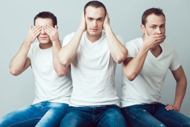 Closeup portrait of three young men in white t-shirts imitating  clipart