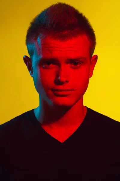 Pop-art style concept. Portrait of brutal young man with short hair — Stockfoto