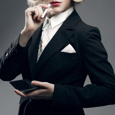 Femme fatale concept. Marlene Dietrich style. Close up retro portrait
