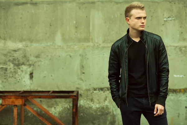 Bad boy concept. Portrait of brutal young man with short hair wet hair — Stock Photo, Image