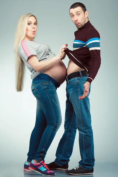Funny sport training of future parents concept. Full length portrait — 图库照片