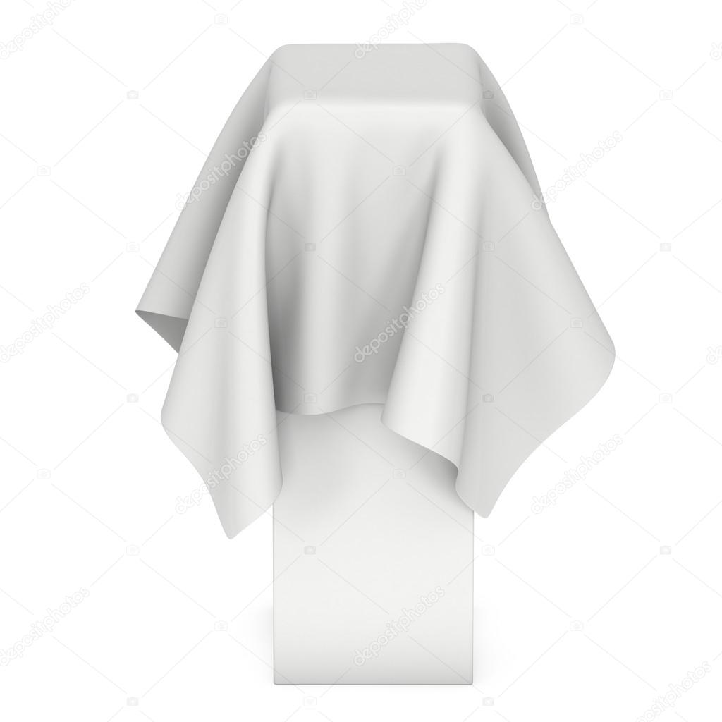 Presentation pedestal cover by white cloth