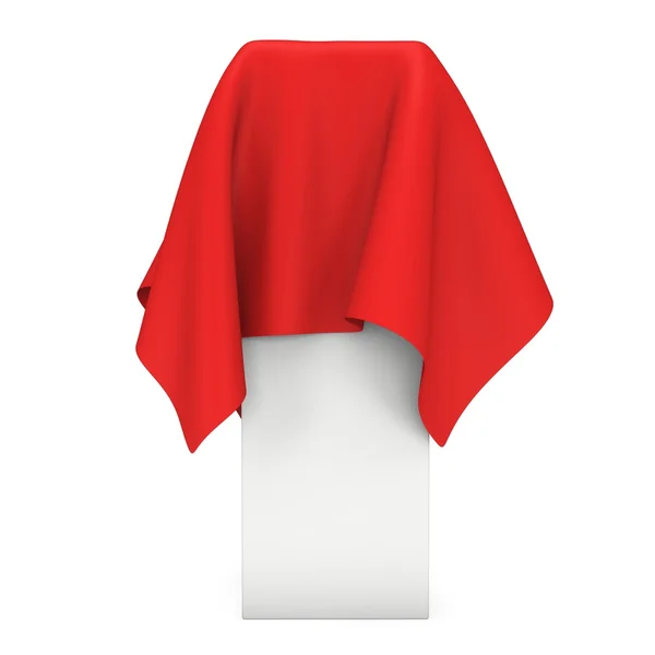 Presentatie voetstuk dekking door rode doek — Stockfoto