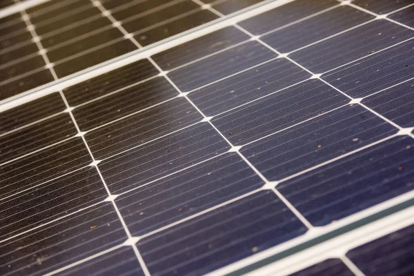 Close-up of solar panels on a sunny day, selective focus.