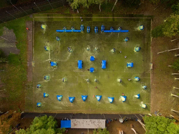 Aerial view of paintball court in the city public park.