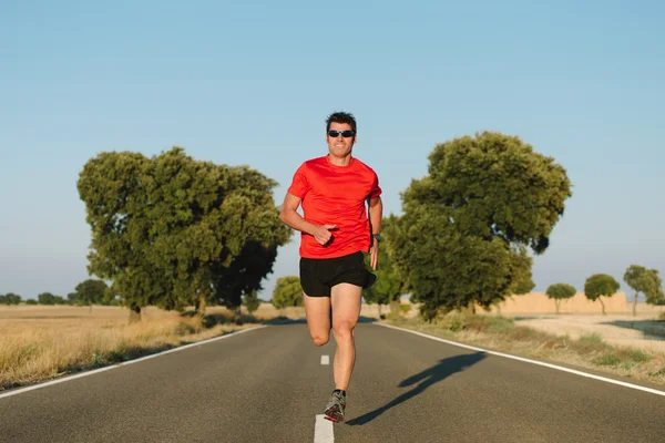 Man running on road — Stock Photo, Image