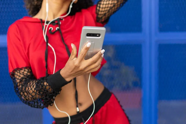 Black Urban Stylish Female Dancer Using Smartphone Listening Music — Stock Photo, Image