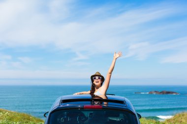 Woman on car vacation travel waving clipart