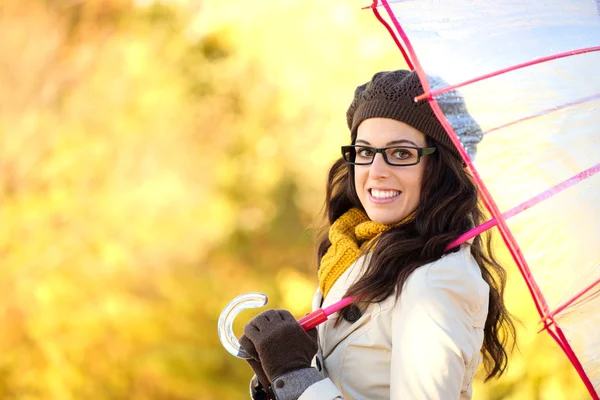 Cheerful fashion woman with umbrella enjoying autumn — 스톡 사진