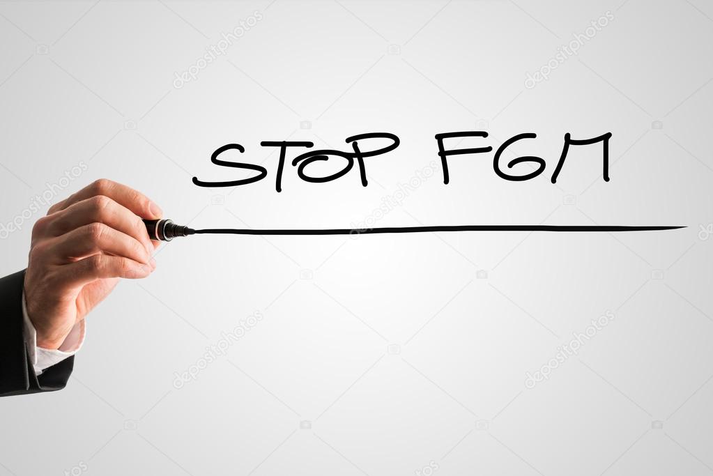 Handwritten sign - Stop FGM